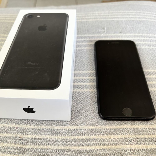 iPhone 7 with 5 cases and 3 screen protectors