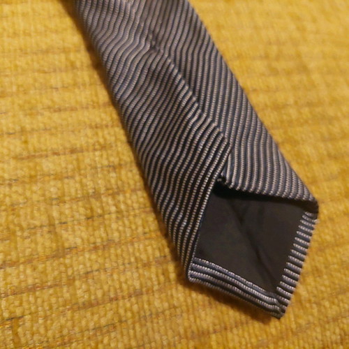 Women's striped tie gray black like new, shiny