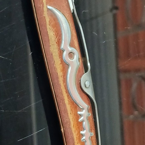 Okapi pocket knife used, carbon steel blade, wooden handle