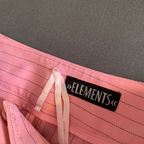 Pink women's pants like new with thin black stripes size XL