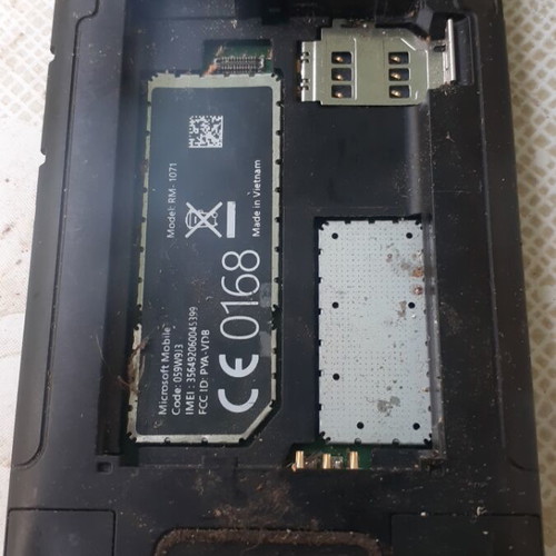 Microsoft 1071 phone used, missing back cover and battery