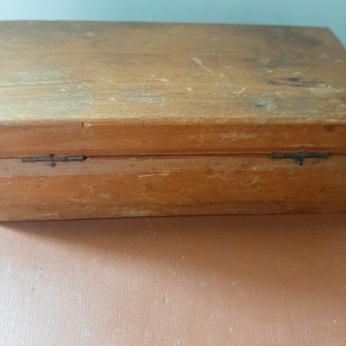 Wooden collectible box with cast iron weights