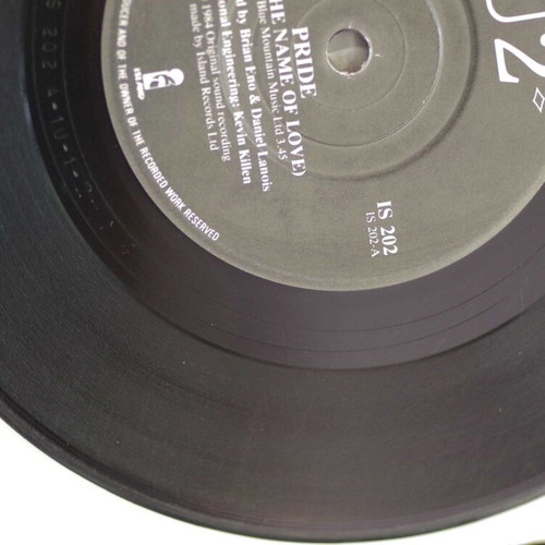 U2 Pride (In The Name Of Love) & Boomerang 7'' vinyl used, rock