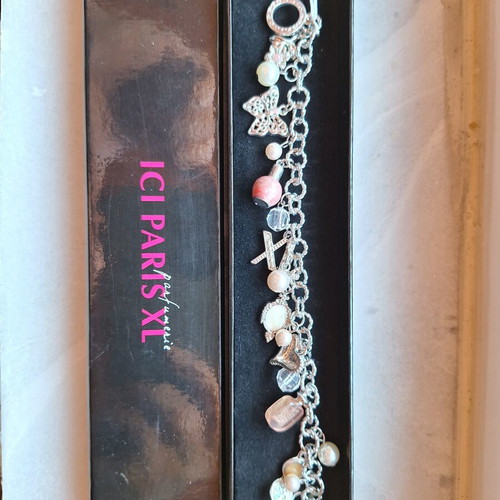 Silver women's bracelet with charms, new