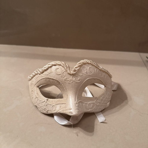 Two ornate masks like new, one gray and one white