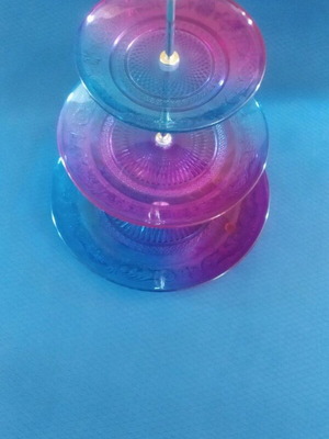 Glass decorative item like new in blue and fuchsia shades
