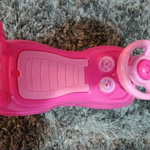 Pink children's toy car used
