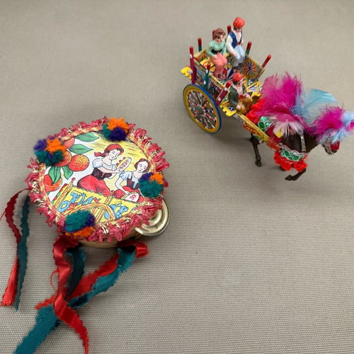 Vintage Sicilian cart with horse and tambourine decoration