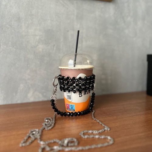 Cup holder handmade with black and silver beads