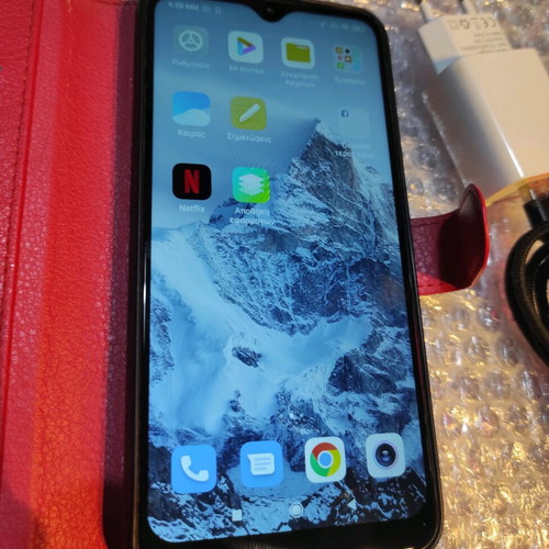 Xiaomi Redmi 8A 32GB phone used with case and charger