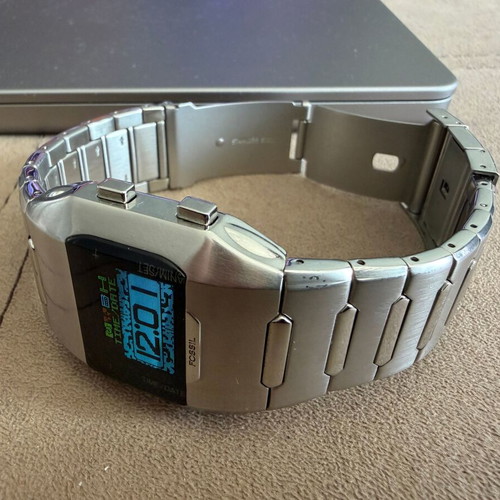 Fossil OLED JR-9465 watch like new, unisex, silver metal band