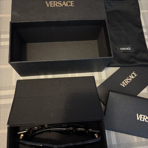 Versace sunglasses for women like new, black and gold
