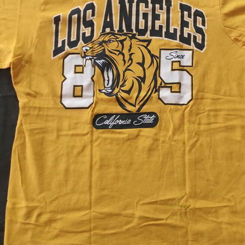 T-shirt medium yellow like new