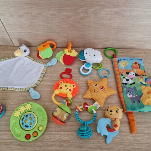 Baby toys like rattles, teethers and soft activity books, like new