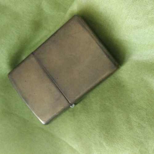 Zippo lighter collectible used, bronze color