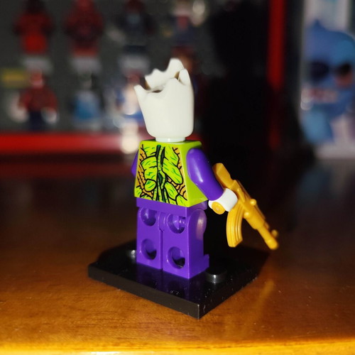 The Groot Who Laughs figure like new with stand and gold AR