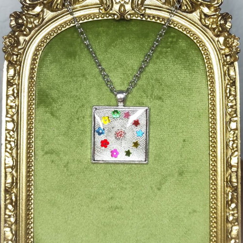 Handmade jewelry set with resin pendant and pink stone earrings