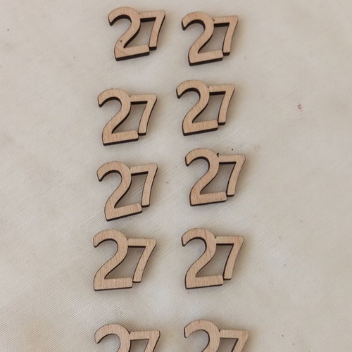 Wooden laser-cut number 27 elements, set of 10