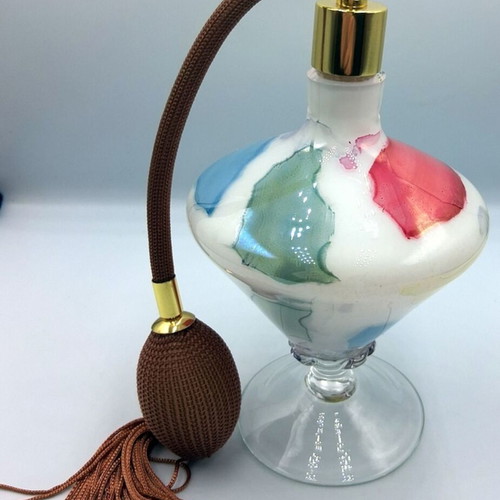 Vintage glass perfume bottle with new atomizer
