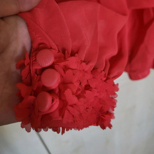 Coral sheer blouse like new with floral sleeve details