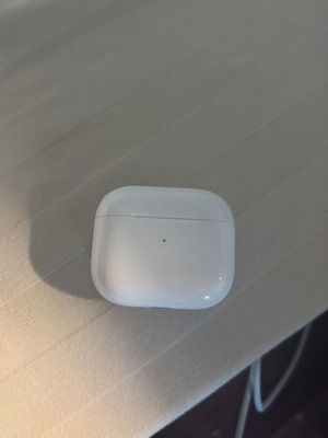 Apple AirPods 3rd Generation used with MagSafe charging case