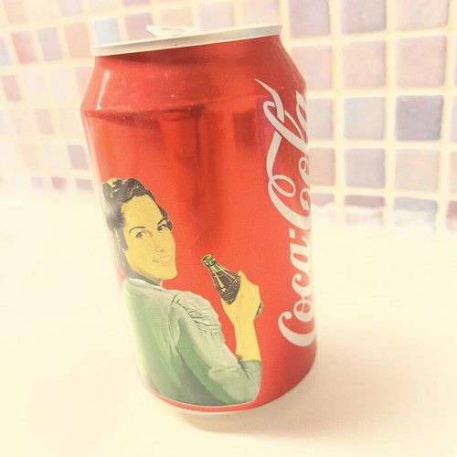Coca Cola Woman collectible used, empty can