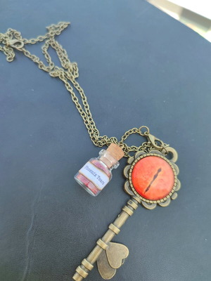 Phoenix Tears necklace new, orange with detachable bottle