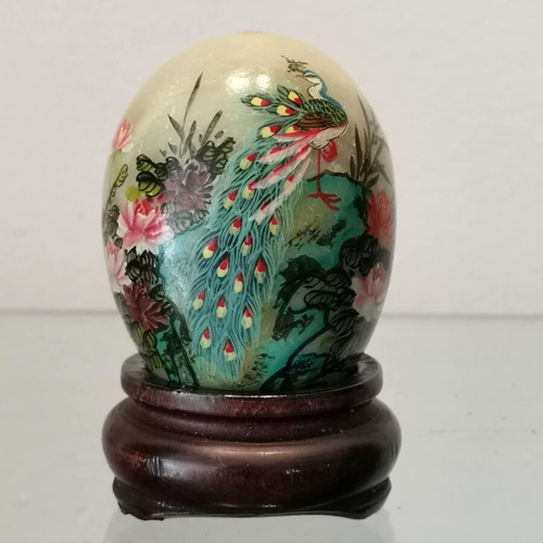 Asian marble egg used with hand-painted design and wooden base