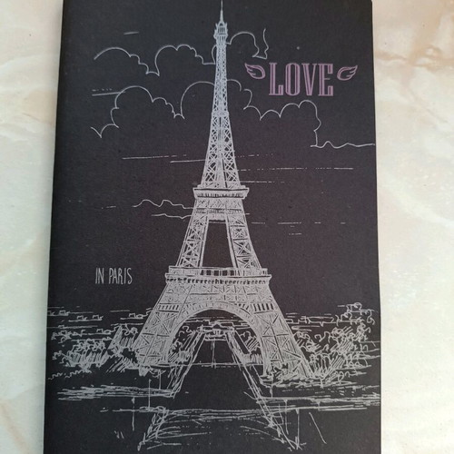 Notebook like new with black inner pages