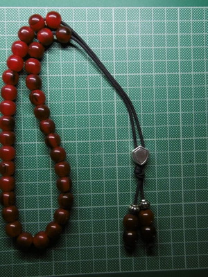 Handmade komboloi with 33+4 acrylic beads and silver shield