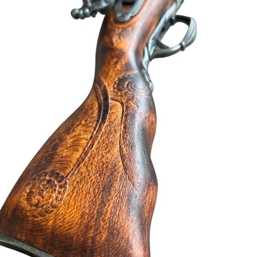 Decorative blunderbuss flintlock pistol used with wooden stock