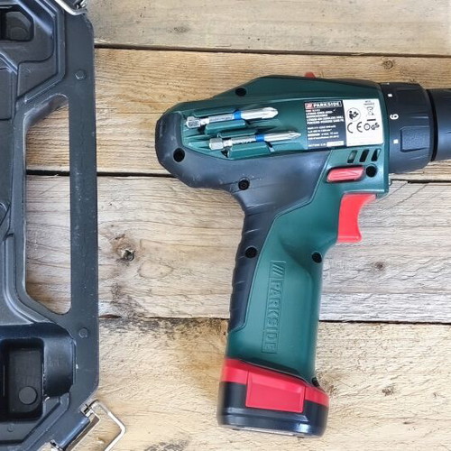 Parkside cordless drill used with charger and manual