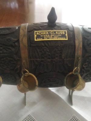 Antique barrel used with brass cups and carvings