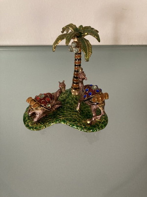 Egyptian decorative piece with camels and palm tree