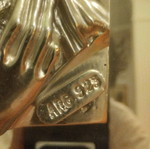 Silver icon used with mirror