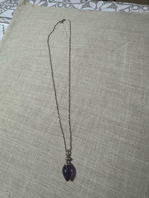 Silver pendant with purple stone like new