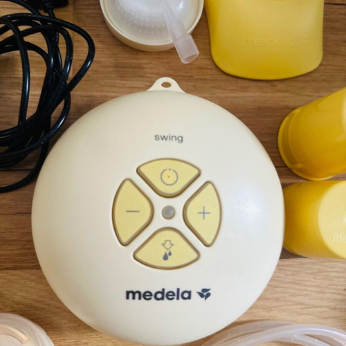 Medela Swing Flex electric breast pump like new with accessories