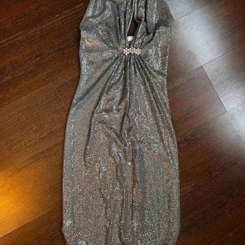 Festive dress silver like new with striking jewel and open back