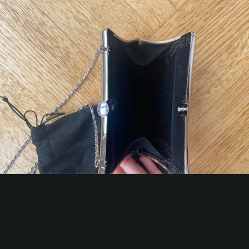 Satin clutch bag with chain strap