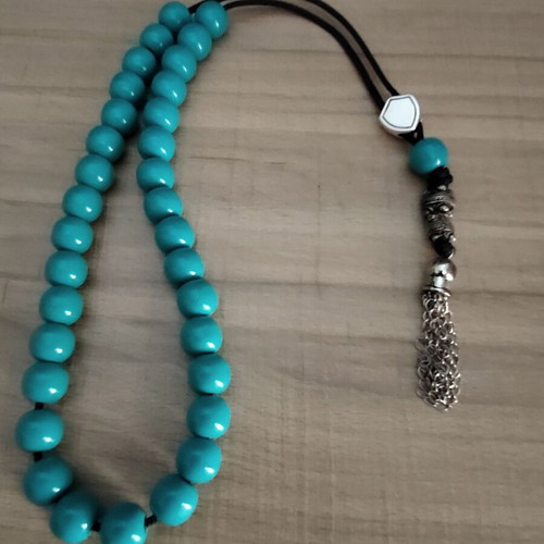 Handmade worry beads with acrylic beads, silver shield and metal tassel