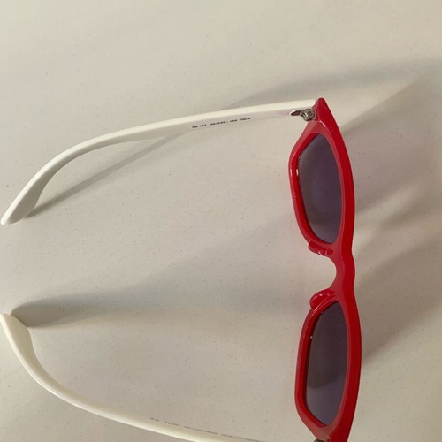 Colored People sunglasses used, red with white arms