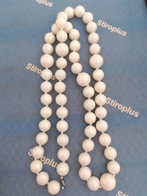 Long necklace with large pearl-like beads used