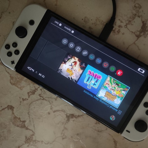 Nintendo Switch OLED White 64GB console with Animal Crossing and accessories