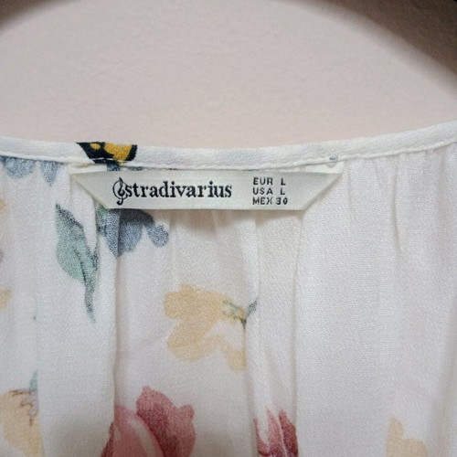 Stradivarius women's blouse used, size Large, white with floral design