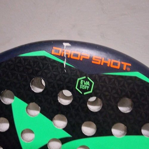 Padel racket used, moderate condition with small cracks