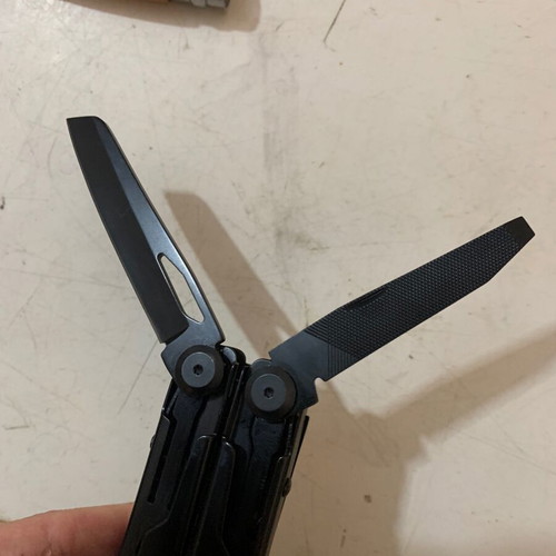 Staal multitool used with case and spare blades