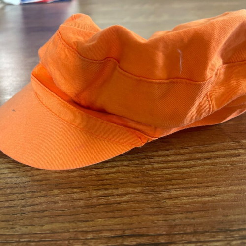 Women's orange hat used