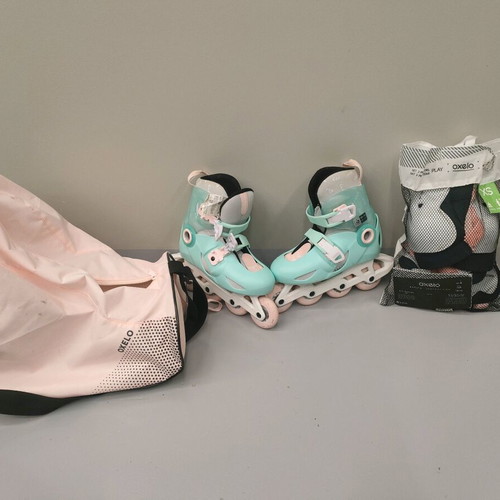 Kids rollers like new with bag and protective set, size 30-32 adjustable to 35