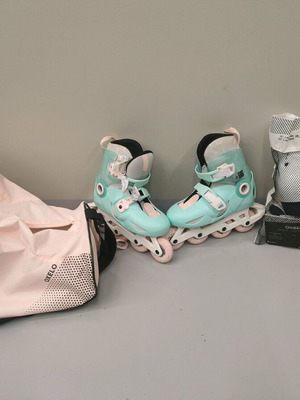 Kids rollers like new with bag and protective set, size 30-32 adjustable to 35