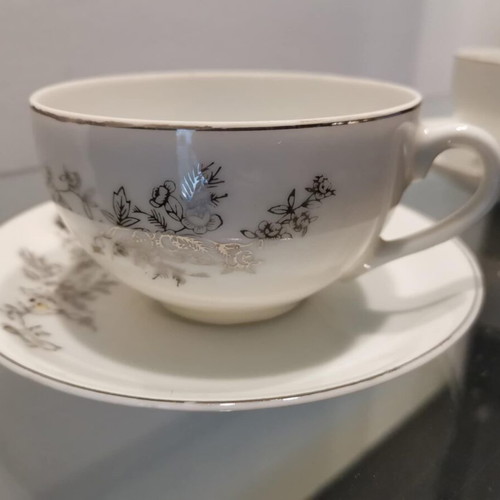Tea cup set used with silver design, set of two
